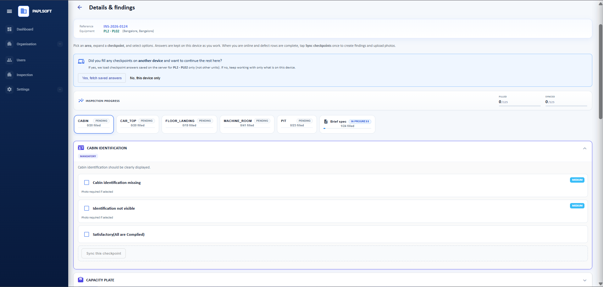 Checkpoint expanded showing defect checkboxes with severity badges